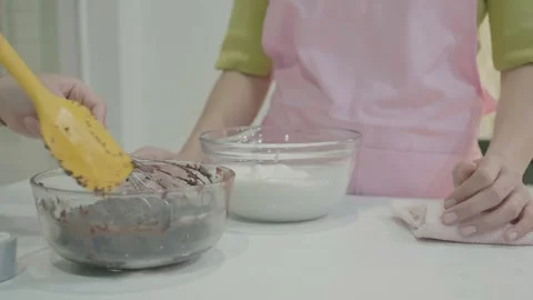 Baking Together: A Delicious Chocolate Mixture Stock Footage 314004130