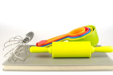 Baking tools and different shapes on white background Stock Photos