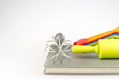 Baking tools and different shapes on white background Stock Photos