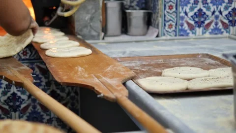 Baking traditional bread in a busy kitchen Video stock 319928676