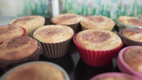 Baking tray with beautiful cupcakes in the kitchen Stock Footage 131957014