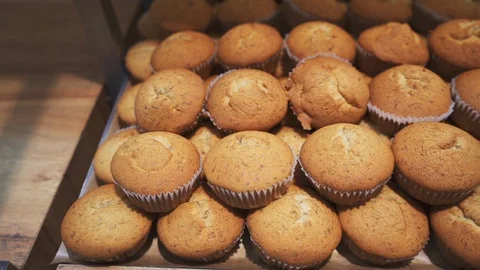 Baking tray full of fresh freshly baked muffins. Stock-Footage 120719727