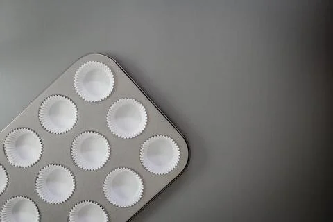Baking tray with non-stick coating and baking paper on black background. top Stock Photos