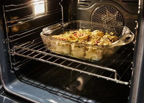 Baking vegetable rolls in the oven Stock Photos