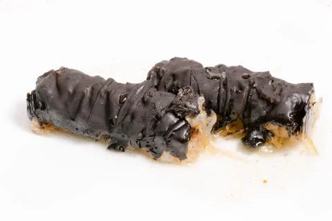 Baklava splashed with chocolate isolated on white background Foto stock