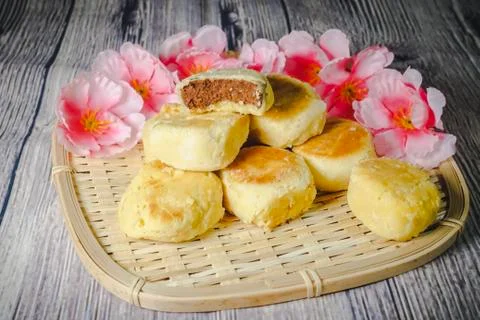 Bakpia Pathok are small, round-shaped Chinese-influenced Indonesian sweet rol Stock Photos