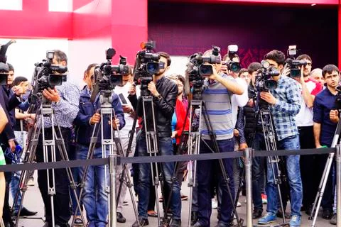 Baku, Azerbaijan-may 17, 2016: Professional TV videographers and photographer Stock Photos