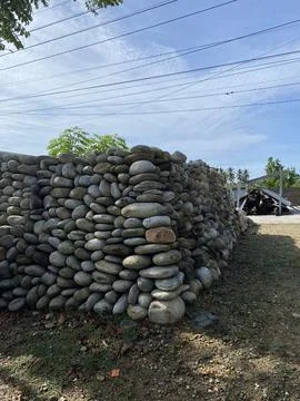 The Balance of the Starting Stone Stack, Caught Under the Sun Stock Photos