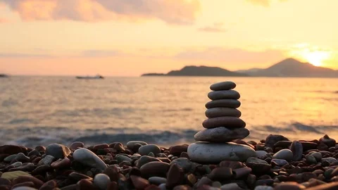 Balance stones on the beach. Peace of mind. Equilibrium life. Ca Stock Footage