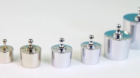 Balance weights for exact analytics in a row Stock Footage 310058581