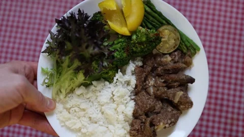 Balanced beef rice and vegetables prepared for a healthy meal Stock Footage 340221504