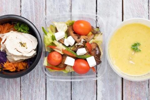 Balanced food boxes diet. Menu suggestions in catering with delivery. Top vie Stock Photos