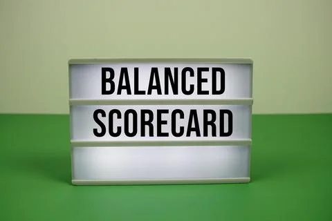 Balanced Scorecard text on LED lightbox on green background Stock Photos
