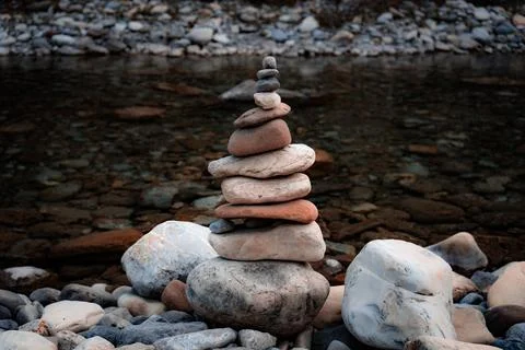 A balanced stack of smooth river rocks Stock Photos