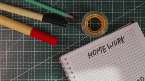 Balanced tabletop view of Homework notebook and healthy snack Stock Footage 341269362