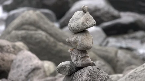 Balanced Zen Stone Structure on Sea Shore Stock Footage 91292998