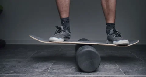 Balancing on a balance board Video stock 135544819