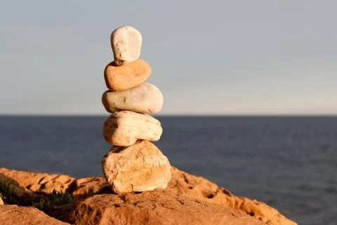 Balancing beach stones Stock Photos