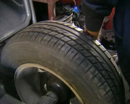 Balancing a car whee Stock Footage 20506558