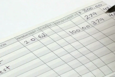 Balancing checkbook - NTSC Stock Footage 662482