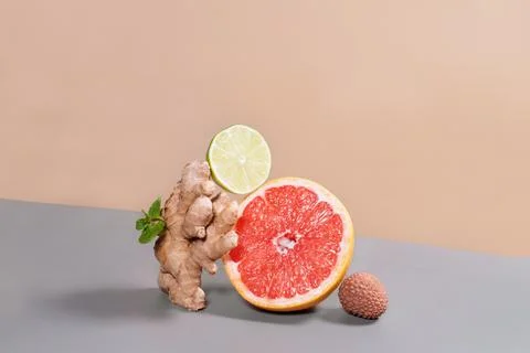 Balancing ginger, lime, lychee vitamins supply. Trendy Stock Photos