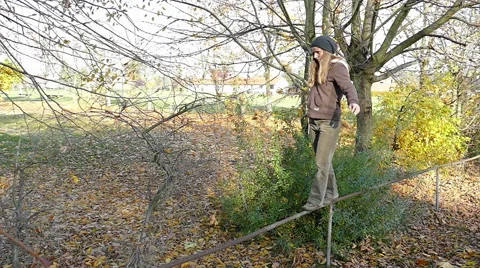 Balancing on a railing Stock Footage 56592326