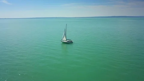 Balaton, Hungary - 4K orbiting full circle around typical Hungarian sailboat Stock Footage 92523484