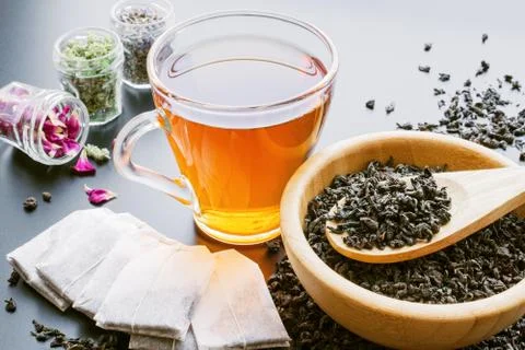 Balck tea with herbs Stock Photos