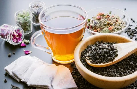 Balck tea with herbs Stock Photos
