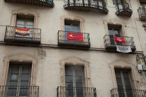 Balconies with flags. Stock Photos