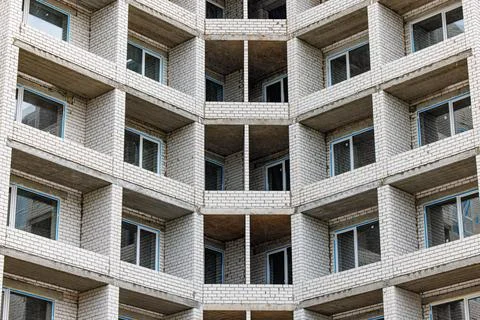 Balconies in Progress: A Building's Emerging Facade Showcasing Architectura.. Stock Photos