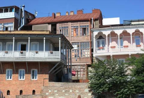 Balconies of tbilisi under bright sunshine Stock Photos