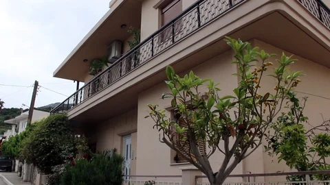 Balcony and side street in small Cretian town Video stock 85877388