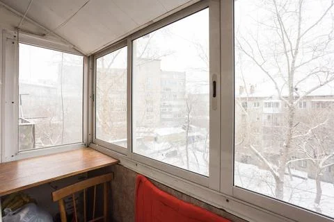 The balcony of an apartment on the upper floors of an apartment building Stock Photos