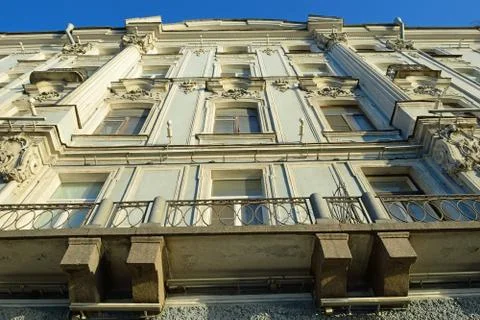 The balcony of the building with an openwork grille Stock Photos