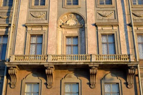 The balcony of the building with an openwork grille Stock Photos