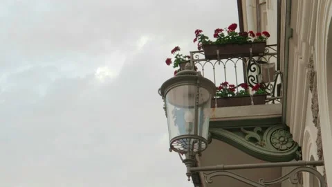 Balcony with flowers classical architecture lantern 스톡 동영상 157387964