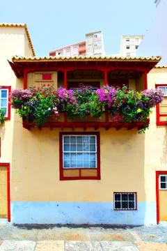 Balcony with flowers Stock Photos