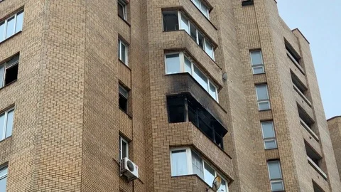 The balcony of a multi-storey building after a fire in the city Stock Footage 103580032