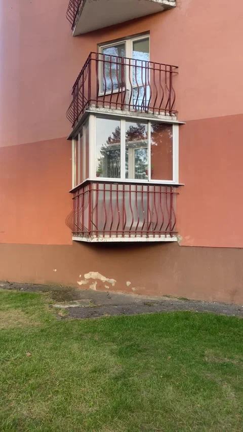 A balcony in a multi-story building. Windows from the house. Vertical video Stock Footage 287944682