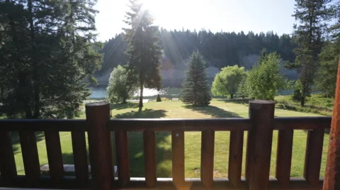 Balcony overlooking river and mountains reveal Stock Footage 45860038