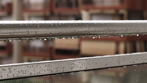 Balcony railings in the rain, selective focus Stock Footage 287319920