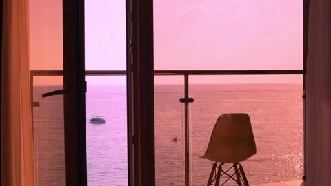 Balcony Sea View from the Window of a Beachfront Room at Evening Colorful Sky Cl Stock-Footage 321542522