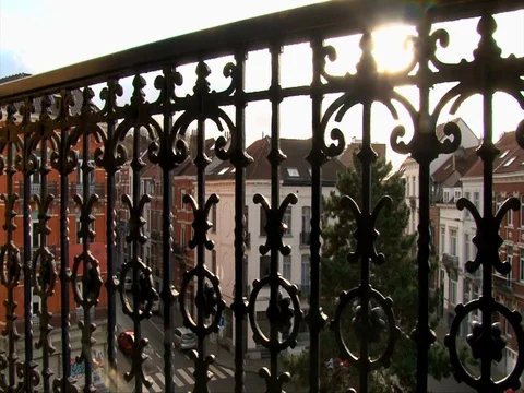 Balcony top view on old town in Europe, dolly shot wrought iron fencing Stock Footage 72962326