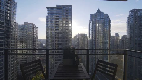 Balcony view of downtown high rises, almost sunset, dolly push in Stock Footage 85165146