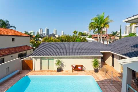 Balcony view looking at pool area and skyline Stock Photos