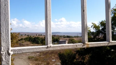 Balcony View. Time lapse of moving clouds over the crop fields on sunny day. Video stock 115088937