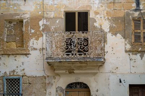 Balcony on a Weathered Facade Stock Photos