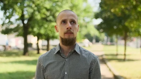 Bald bearded man just come over to the camera Stock Footage 157992236