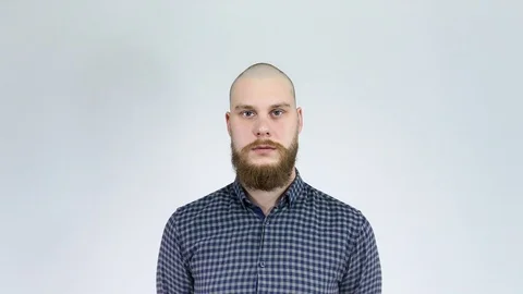 Bald man with beard looking at camera and smiling like crazy. Stock Footage 122012482